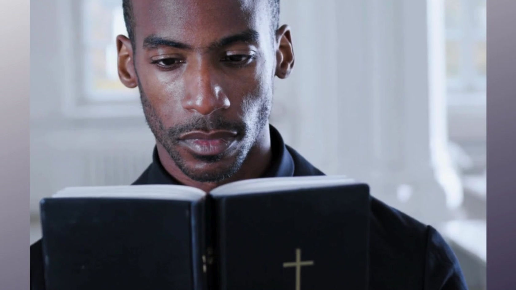 pastor reading the bible